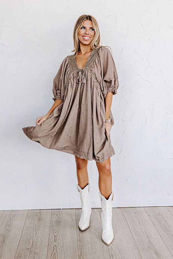 Writers Retreat Babydoll Dress In Taupe