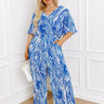 Peak Party Vibes Pleated Jumpsuit In Blue Curves Image - 1