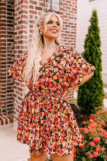 Make A Bold Statement with This Vibrant Romper main image 0