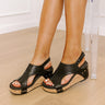 The Blair Faux Leather Wedge in Black Image - 1