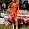 Tailgate Ready Mineral Wash Denim Romper in Red Image - 1