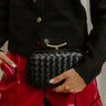 Allison Faux Leather Woven Clutch in Black Image 1