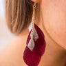 The Jet Setter Feather Earrings In Wine Image - 1