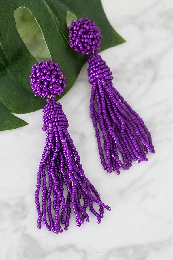 Beach Bound Tassel Earrings In Purple