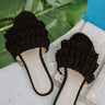 The Avery Faux Suede Ruffle Sandal in Black Image - 1