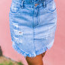 The Chloe Distressed Denim Skirt in Light Wash Image - 1