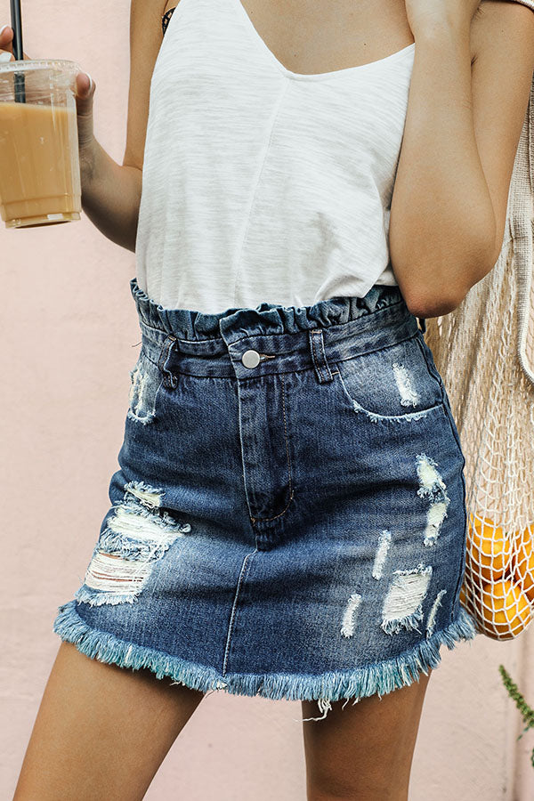 The Chloe Distressed Denim Skirt in Medium Wash Image - 1