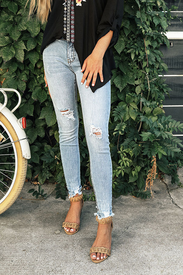 The Eliza Midrise Distressed Ankle Skinny in Light Wash