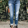 The Flora Mid Rise Distressed Skinny Image - 1