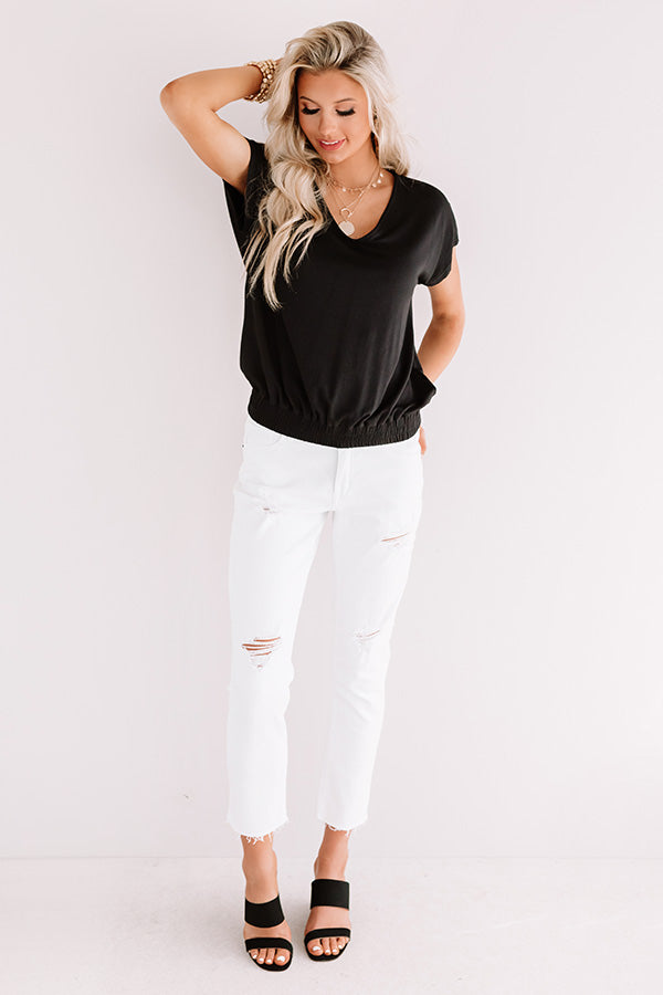 The Avonlea Midrise Distressed Relaxed Skinny