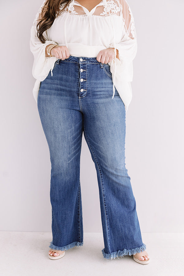 The Alys Midrise Frayed Flares In Dark Wash Curves Image - 1