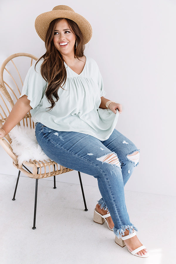 The Byrdie Midrise Distressed Ankle Skinny Curves Image - 2