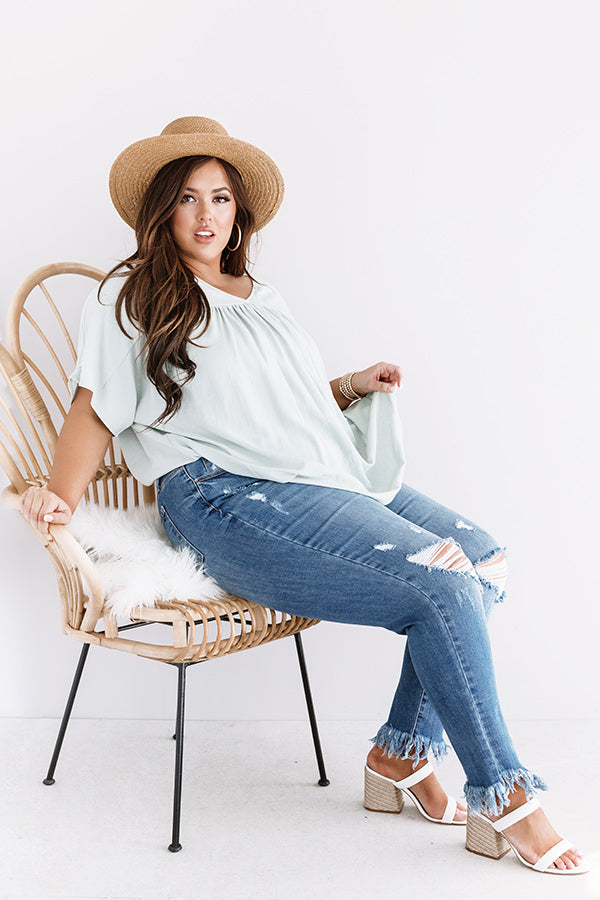 The Byrdie Midrise Distressed Ankle Skinny Curves Image - 4