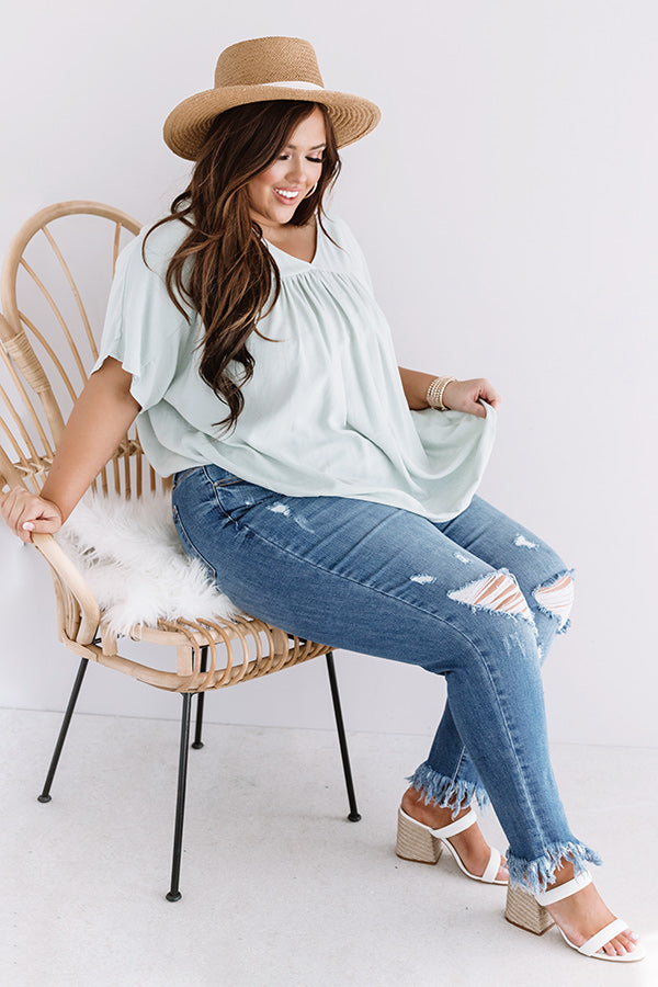 The Byrdie Midrise Distressed Ankle Skinny Curves Image - 3