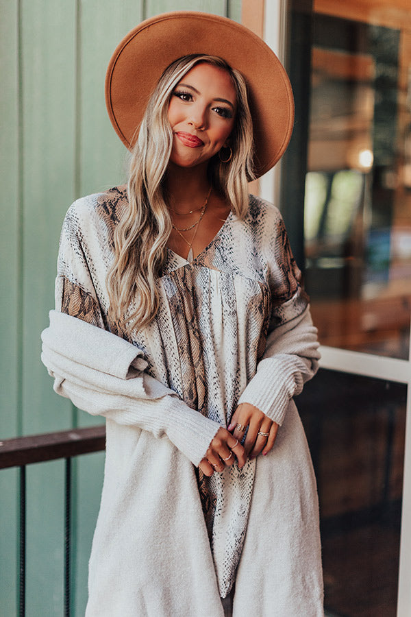 Snake print babydoll ruffle dress