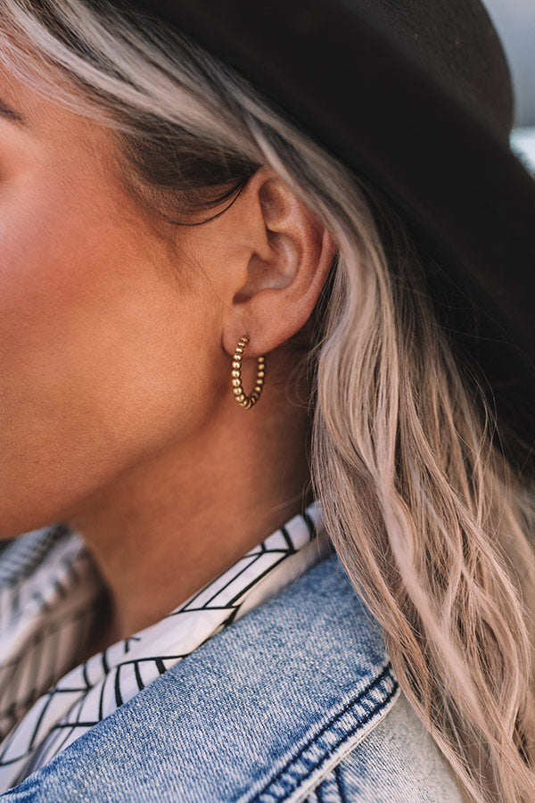 Kendra Scott Josie Huggie Earrings in Vintage Gold Image - 1