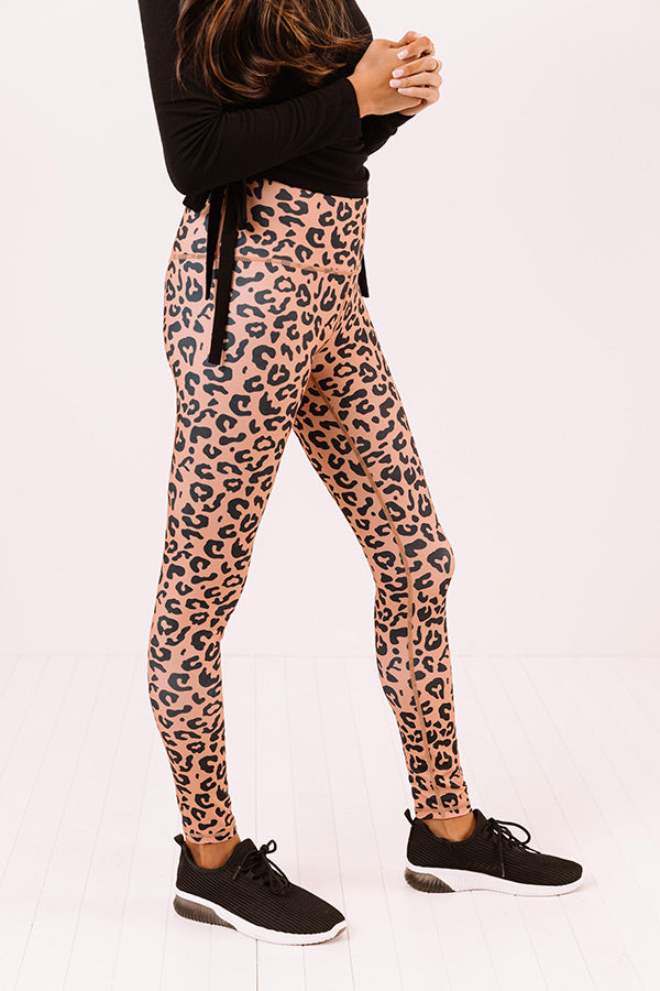 https://www.shopimpressions.com/cdn/shop/products/2101183749000-2021020313562700-30441557crushing-it-high-waist-leopard-active-leggings_1024x1024.jpg?v=1612918827