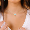 Kendra Scott Elisa Satellite Gold Pendant Necklace in Light Blue Magnesite Image - 1