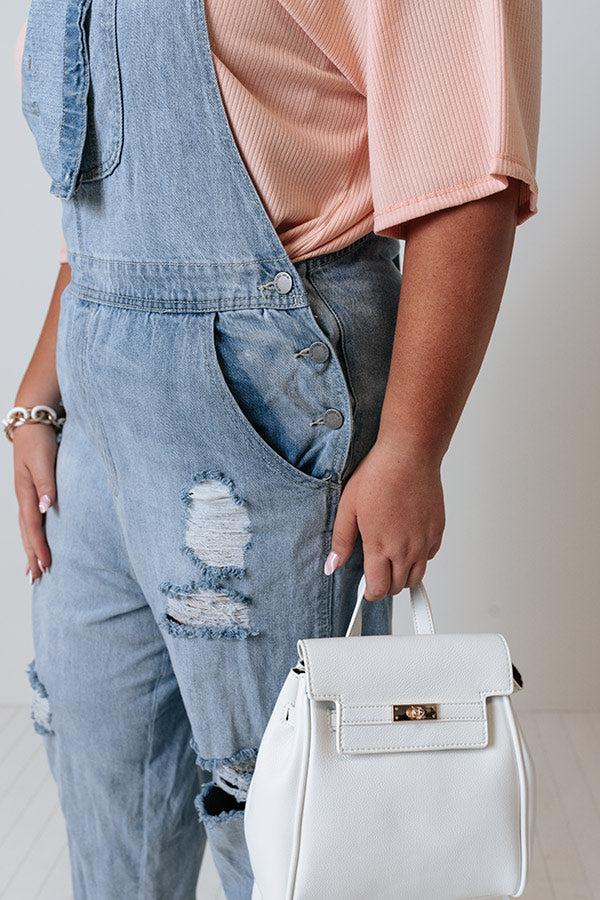 The Caspin Distressed Overalls In Light Wash Curves Image - 3