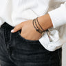 Kendra Scott Shiva Gold Wrap Bracelet in Black Banded Agate Image - 1