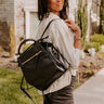 Changing Places Faux Leather Backpack In Black Image - 1