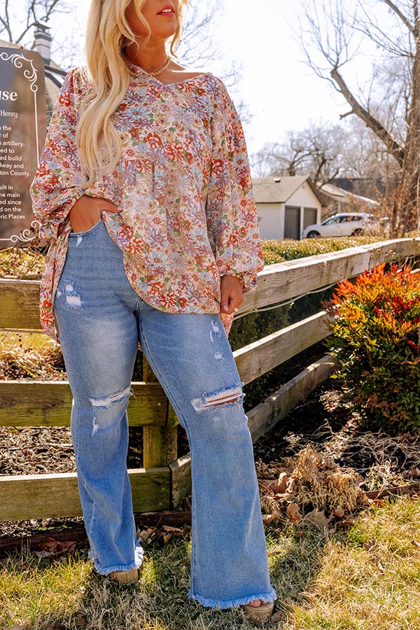 Risen The Mellow Midrise Distressed Flare Curves Image - 3