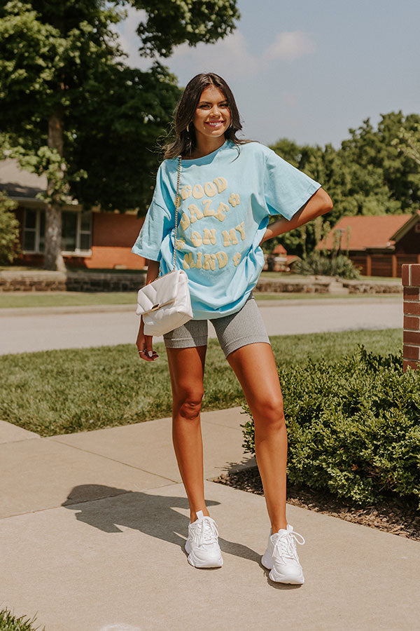 white & blue graphic tee