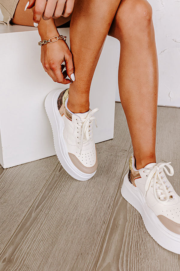 The Avianna Faux Leather Sneaker In Gold