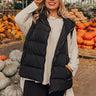 Venture Out Puffer Vest in Black Curves Image - 1