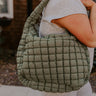 Travel Far Puffer Tote In Olive Image - 1